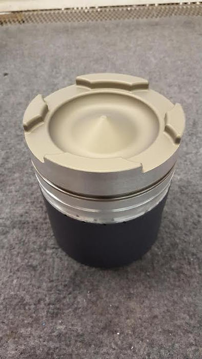Piston coated with thermal barrier coating